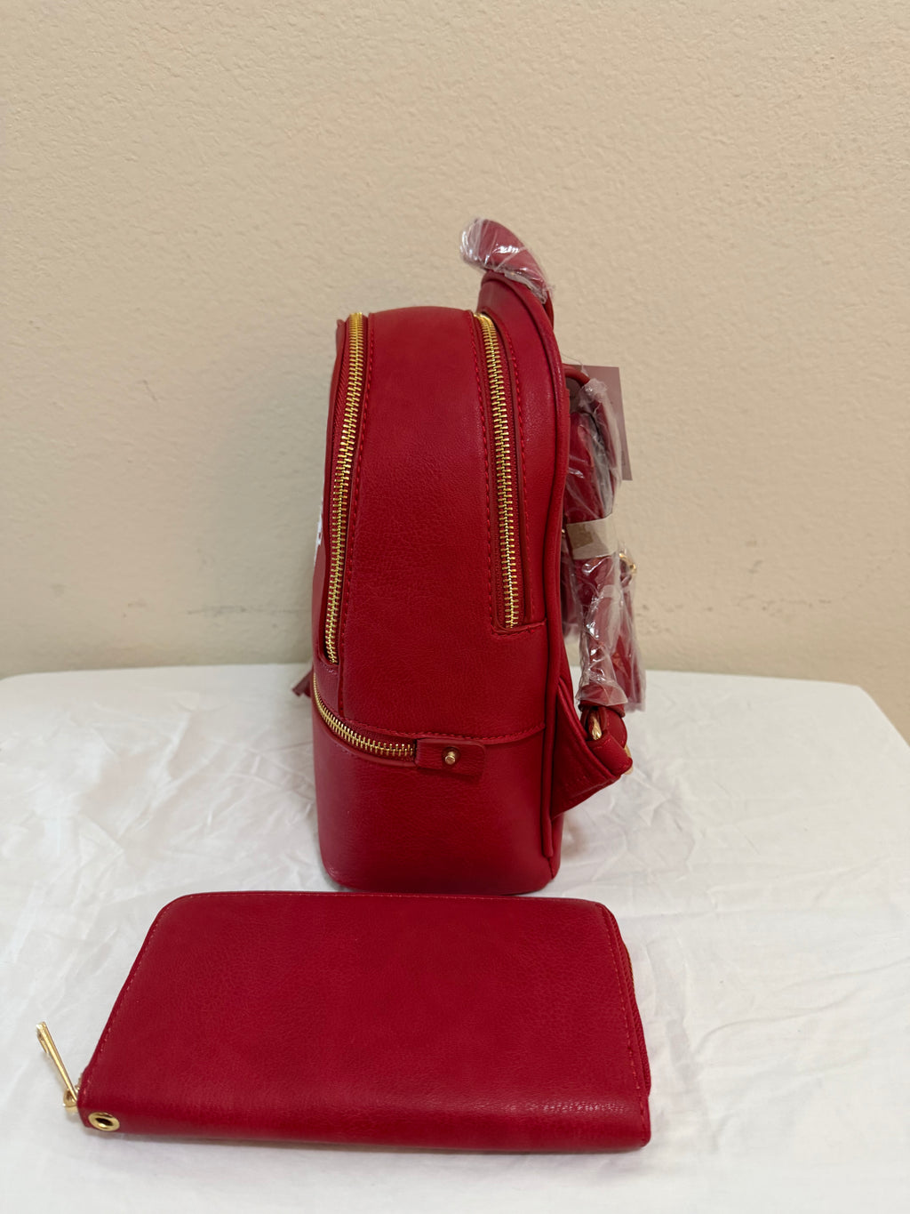 University of Houston Mini backpack with matching colored wallet