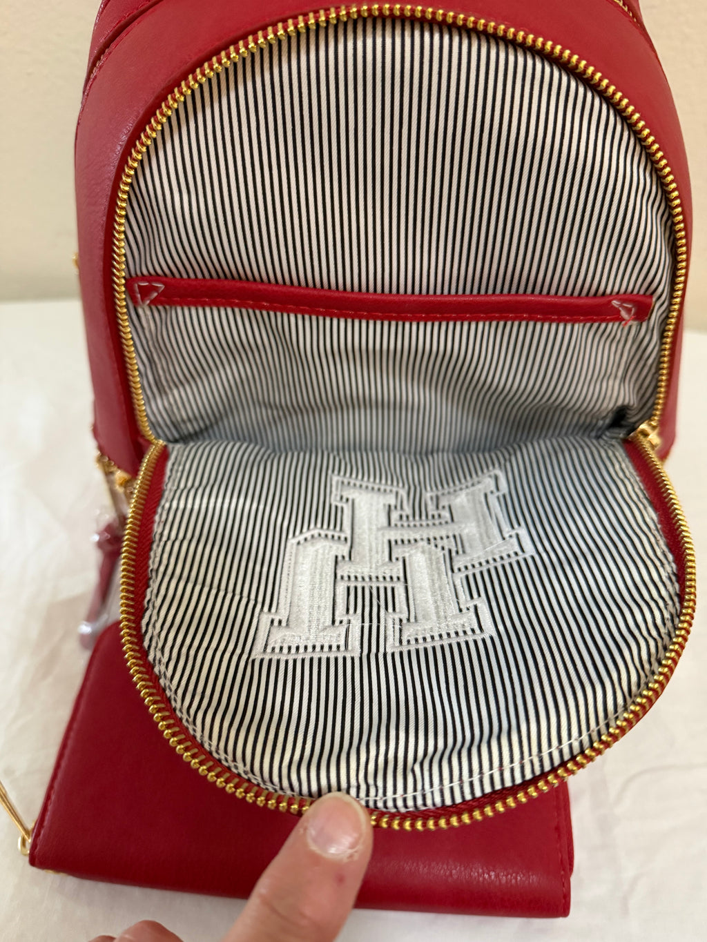 University of Houston Mini backpack with matching colored wallet